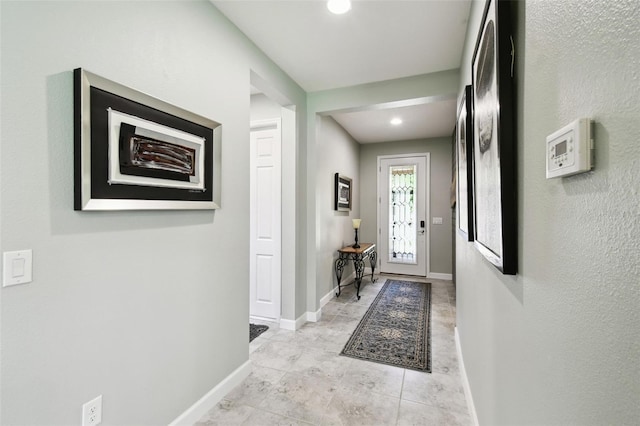 1272 Bonita Canyon Dr, Kissimmee, FL 34759 - doorway with light tile patterned floors and baseboards