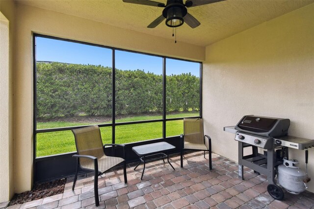 1272 Bonita Canyon Dr, Kissimmee, FL 34759 - sunroom with a ceiling fan