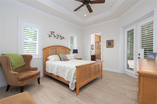 7 Spanish Moss Ct, Palm Coast, FL 32137 - bedroom with light wood finished floors, access to outside, a raised ceiling, ornamental molding, and baseboards