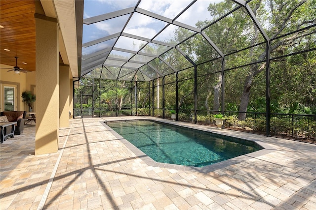 7 Spanish Moss Ct, Palm Coast, FL 32137 - outdoor pool featuring a patio area, a ceiling fan, and a lanai