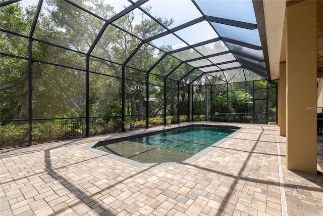 7 Spanish Moss Ct, Palm Coast, FL 32137 - outdoor pool with a patio and glass enclosure