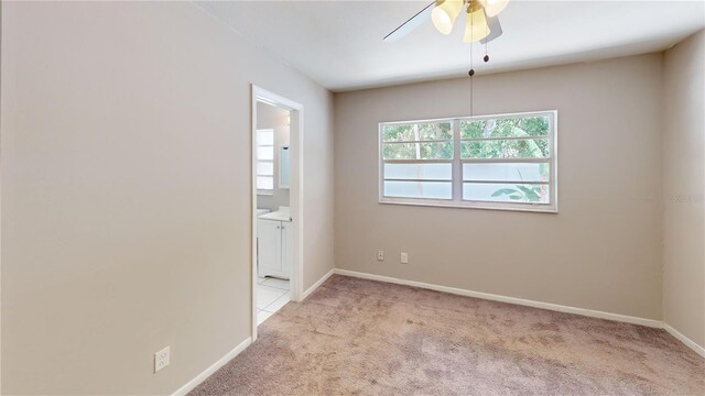 114 N Alderwood St, Winter Springs, FL 32708 - empty room with carpet floors, ceiling fan, and baseboards
