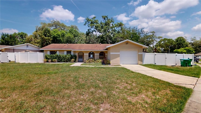 114 N Alderwood St, Winter Springs, FL 32708 - single story home with a gate, a garage, and concrete driveway
