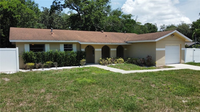 114 N Alderwood St, Winter Springs, FL 32708 - ranch-style house with a garage, stucco siding, and concrete driveway