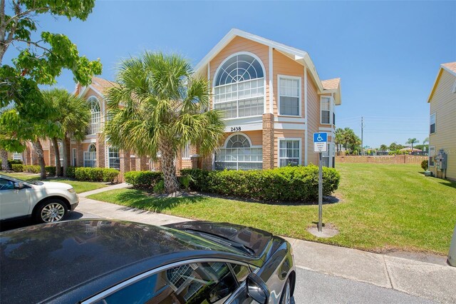2438 Sweetwater Club Cir Unit 50, Kissimmee, FL 34746 - multi unit property with a front yard