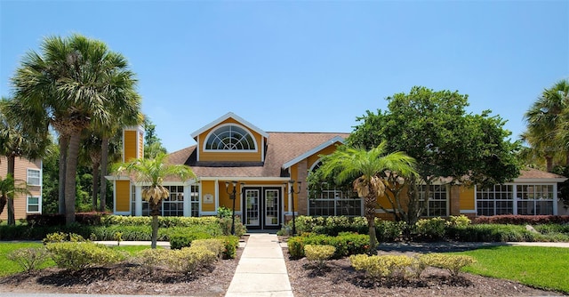 2438 Sweetwater Club Cir Unit 50, Kissimmee, FL 34746 - view of front of house with french doors