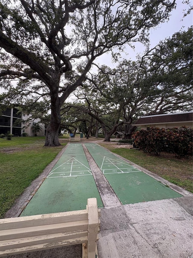 870 Virginia St Unit 108, Dunedin, FL 34698 - surrounding community with a lawn and shuffleboard