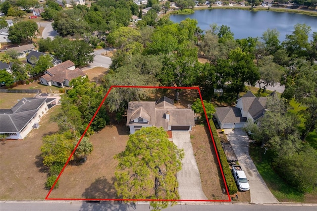 120 W Minnehaha Ave, Clermont, FL 34711 - aerial perspective of suburban area featuring a nearby body of water and property parcel outlined