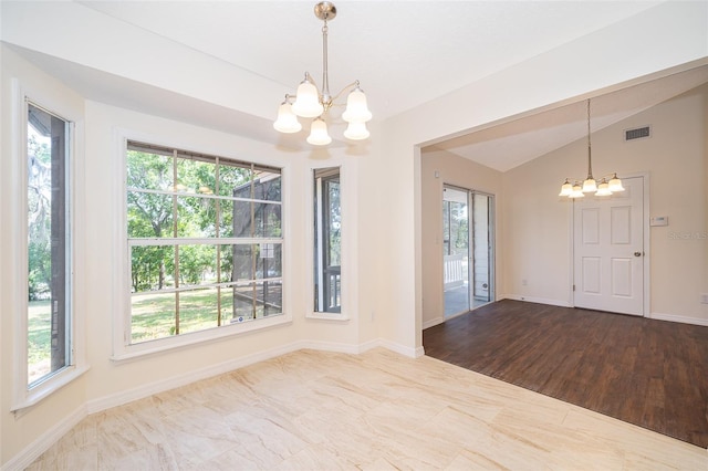 120 W Minnehaha Ave, Clermont, FL 34711 - empty room with a chandelier, healthy amount of natural light, baseboards, and lofted ceiling