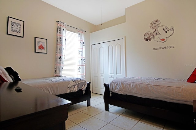 426 Prestwick Dr, Davenport, FL 33897 - bedroom featuring a closet and light tile patterned floors