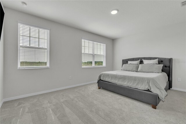 12190 Plumpton Dr, Winter Garden, FL 34787 - bedroom featuring carpet flooring and baseboards