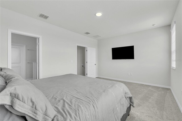 12190 Plumpton Dr, Winter Garden, FL 34787 - bedroom with light carpet, baseboards, and recessed lighting