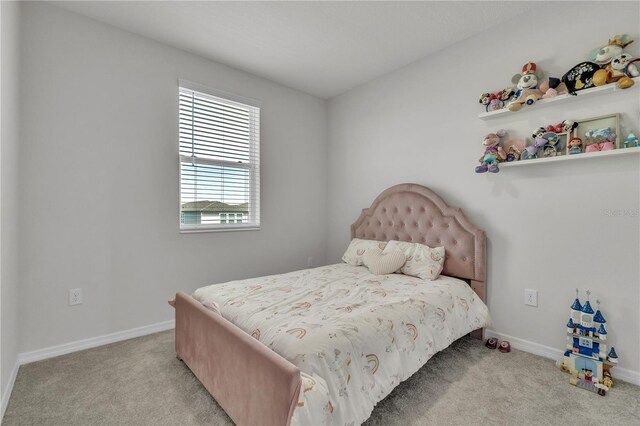 12190 Plumpton Dr, Winter Garden, FL 34787 - carpeted bedroom featuring baseboards