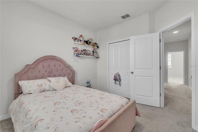 12190 Plumpton Dr, Winter Garden, FL 34787 - carpeted bedroom featuring a closet and baseboards