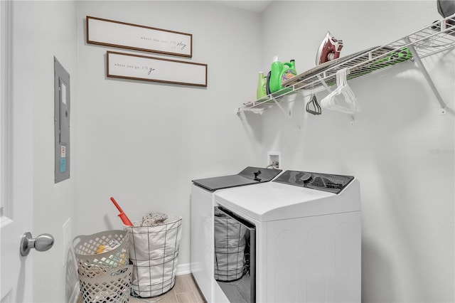 12190 Plumpton Dr, Winter Garden, FL 34787 - laundry room featuring separate washer and dryer and light wood finished floors