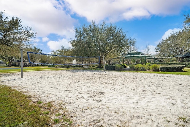 7013 Beargrass Rd, Harmony, FL 34773 - view of community featuring volleyball court