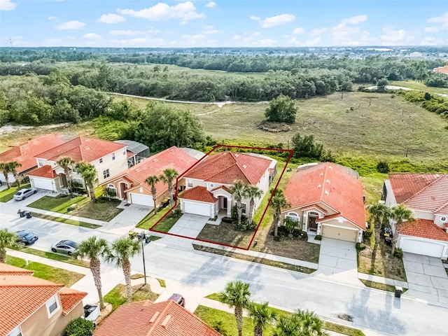 321 Rosso Dr, Davenport, FL 33837 - aerial perspective of suburban area with property parcel outlined