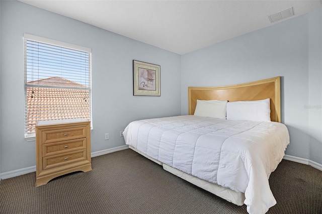 321 Rosso Dr, Davenport, FL 33837 - bedroom featuring carpet and baseboards