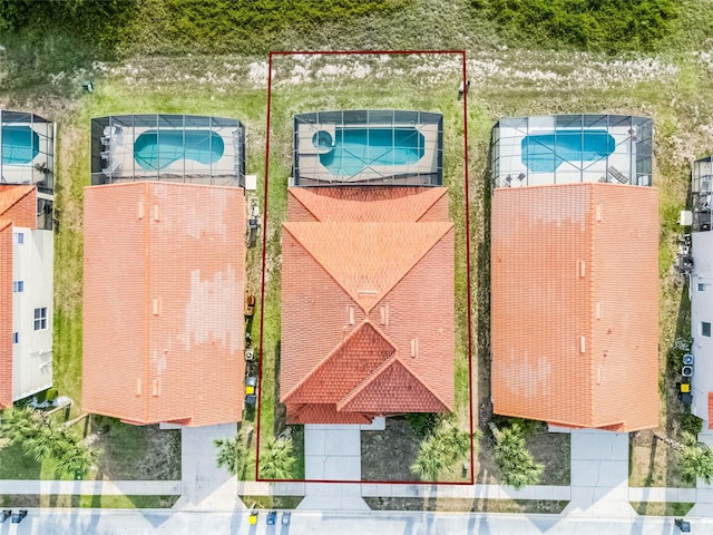 321 Rosso Dr, Davenport, FL 33837 - aerial view of property's location with property boundaries highlighted and a pool area