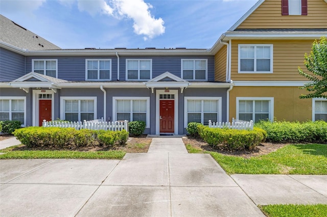 2620 Lodi Cir Unit 103, Kissimmee, FL 34746 - view of property with stucco siding