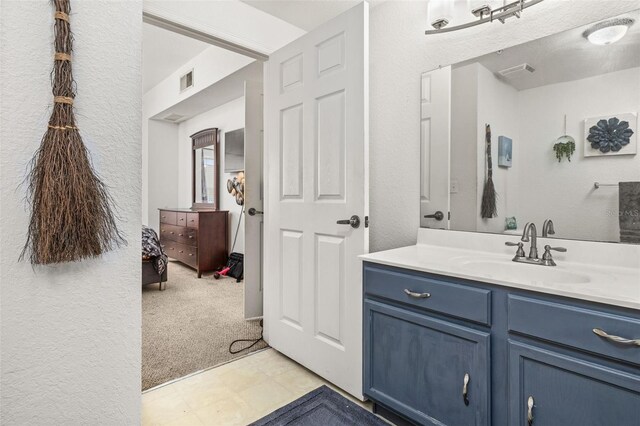2620 Lodi Cir Unit 103, Kissimmee, FL 34746 - bathroom with vanity and tile patterned floors