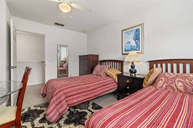 2620 Lodi Cir Unit 103, Kissimmee, FL 34746 - bedroom with carpet floors and ceiling fan