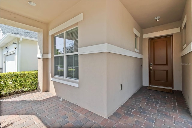 5009 E Fountainwood Dr, Saint Cloud, FL 34772 - entrance to property featuring stucco siding