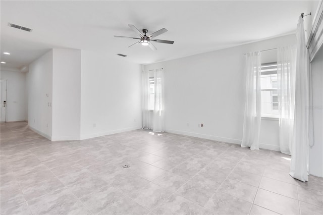 5009 E Fountainwood Dr, Saint Cloud, FL 34772 - spare room with a ceiling fan, light tile patterned floors, baseboards, and recessed lighting