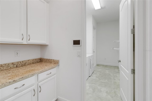 5009 E Fountainwood Dr, Saint Cloud, FL 34772 - laundry area with washer and clothes dryer and baseboards