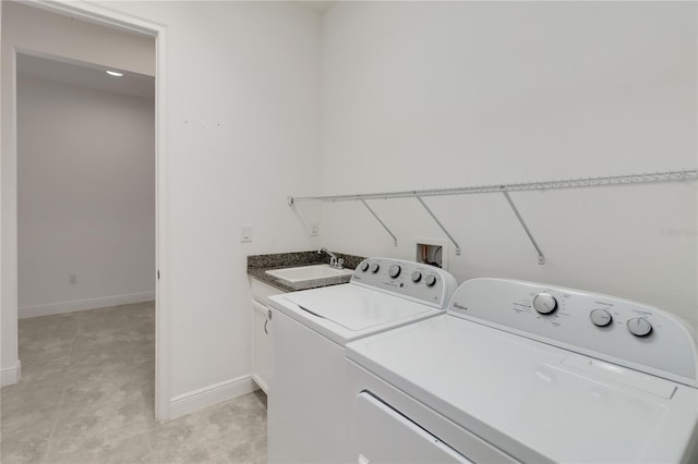 5009 E Fountainwood Dr, Saint Cloud, FL 34772 - laundry area with independent washer and dryer, baseboards, and cabinet space