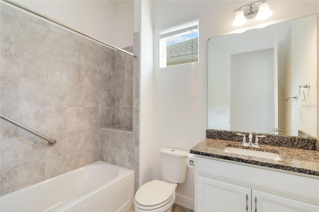 5009 E Fountainwood Dr, Saint Cloud, FL 34772 - full bath featuring toilet, vanity, shower / bath combination, and baseboards