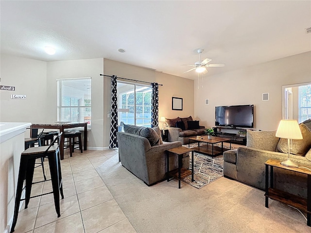 518 Brighton Dr, Davenport, FL 33897 - living area featuring plenty of natural light, a ceiling fan, and light tile patterned floors