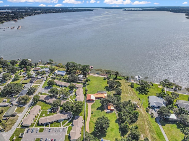 955 Mansfield Rd, Tavares, FL 32778 - aerial view of property's location featuring a large body of water and nearby suburban area