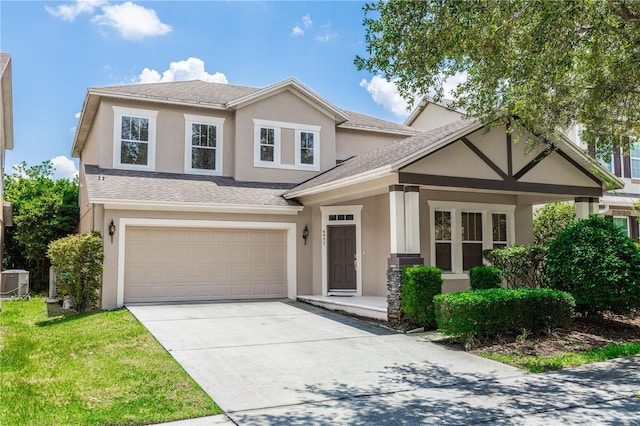 6957 Northwich Dr, Windermere, FL 34786 - view of front of house with stucco siding, driveway, a garage, and cooling unit