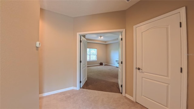 6957 Northwich Dr, Windermere, FL 34786 - hallway with carpet floors and baseboards