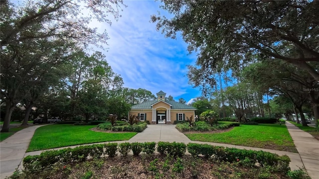 6957 Northwich Dr, Windermere, FL 34786 - surrounding community featuring a yard