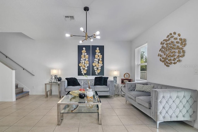 3400 Mt Vernon Way, Kissimmee, FL 34741 - living area featuring stairs, tile patterned flooring, and a chandelier