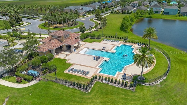 3400 Mt Vernon Way, Kissimmee, FL 34741 - drone / aerial view of a pool and a nearby body of water