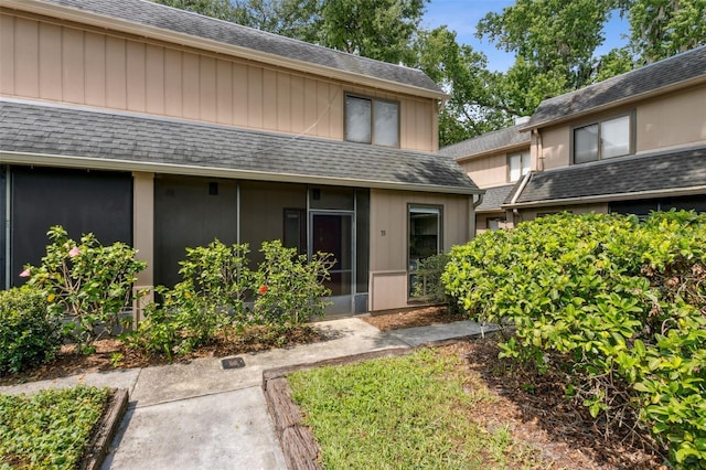 411 Sheoah Blvd Unit 33, Winter Springs, FL 32708 - property entrance with a shingled roof