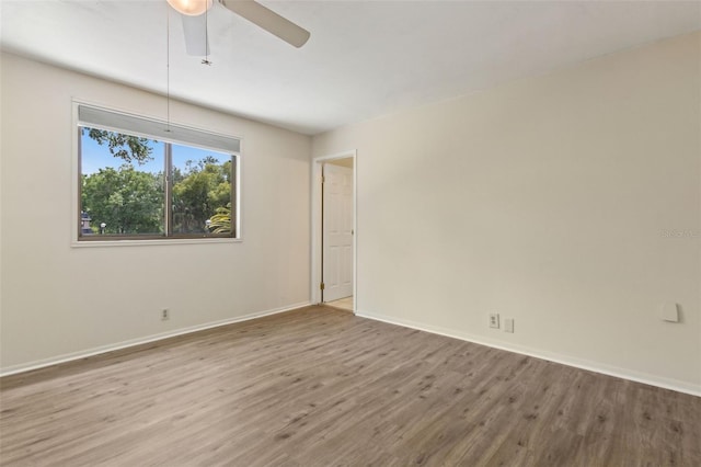 411 Sheoah Blvd Unit 33, Winter Springs, FL 32708 - spare room with wood finished floors, baseboards, and a ceiling fan