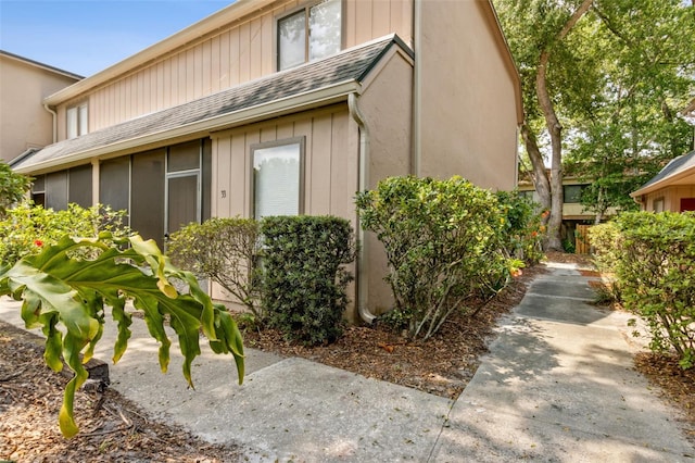 411 Sheoah Blvd Unit 33, Winter Springs, FL 32708 - view of side of property featuring roof with shingles
