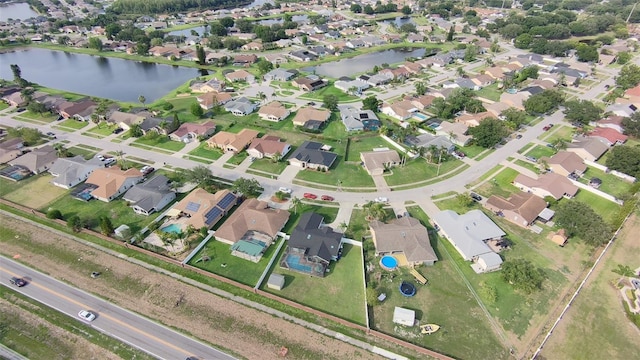 2410 Sweetwater Blvd, Saint Cloud, FL 34772 - aerial view of property and surrounding area featuring nearby suburban area and a nearby body of water