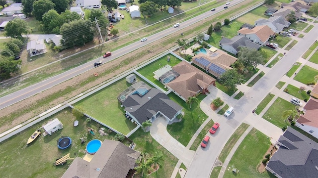 2410 Sweetwater Blvd, Saint Cloud, FL 34772 - aerial view of property and surrounding area with nearby suburban area