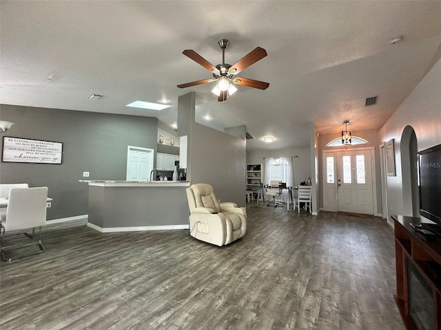 2410 Sweetwater Blvd, Saint Cloud, FL 34772 - sitting room with lofted ceiling, wood finished floors, a ceiling fan, and baseboards