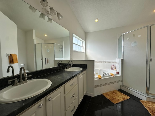 2410 Sweetwater Blvd, Saint Cloud, FL 34772 - full bath with a shower stall, a garden tub, double vanity, tile patterned floors, and vaulted ceiling