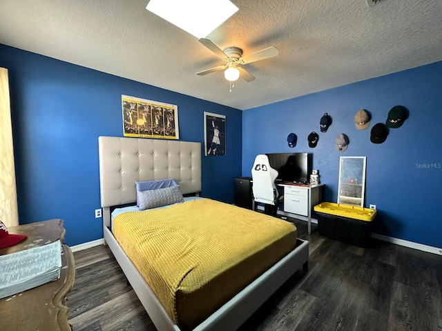 2410 Sweetwater Blvd, Saint Cloud, FL 34772 - bedroom with wood finished floors, baseboards, a textured ceiling, and a ceiling fan
