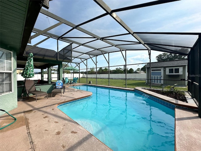 2410 Sweetwater Blvd, Saint Cloud, FL 34772 - swimming pool featuring a patio, glass enclosure, and a yard