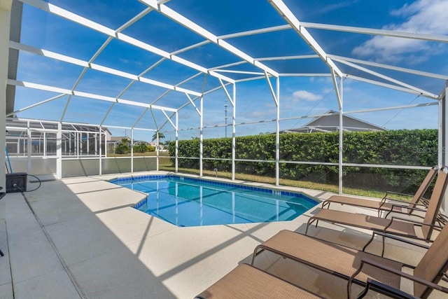 344 High Point Dr, Davenport, FL 33837 - view of pool featuring a patio area and glass enclosure