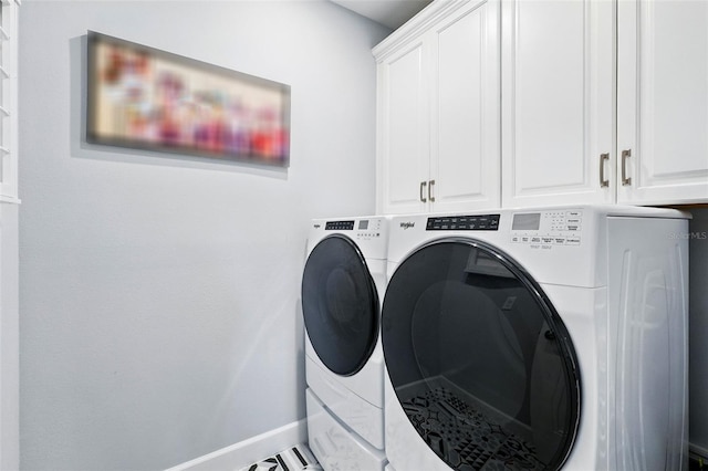 7400 Estuary Lake Loop, Celebration, FL 34747 - laundry room featuring washer and dryer and cabinet space