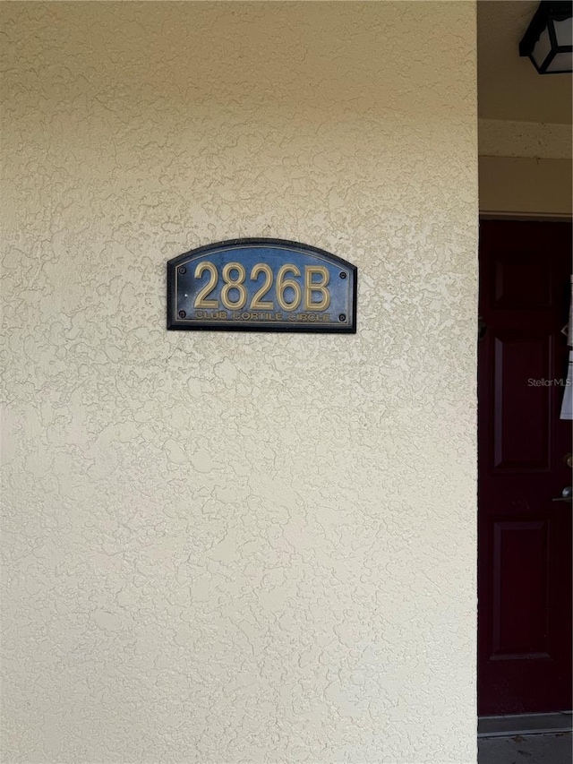 2826 Club Cortile Cir Unit B, Kissimmee, FL 34746 - exterior view of stucco siding